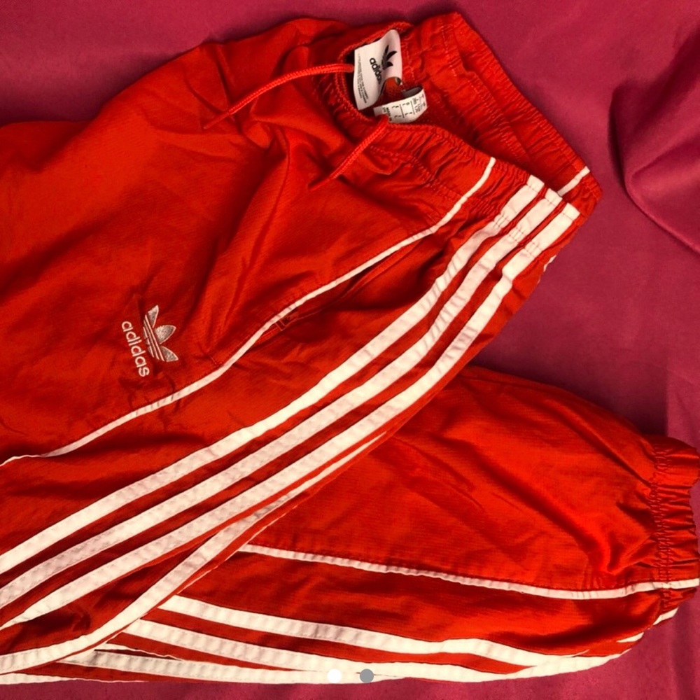Orange adidas trackpants